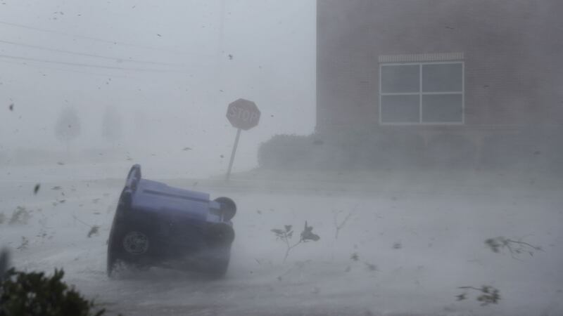 A trash can and debris are blown down a street by Hurricane Michael  in Panama City, Florida, US. Photograph: Joe Raedle/Getty Images
