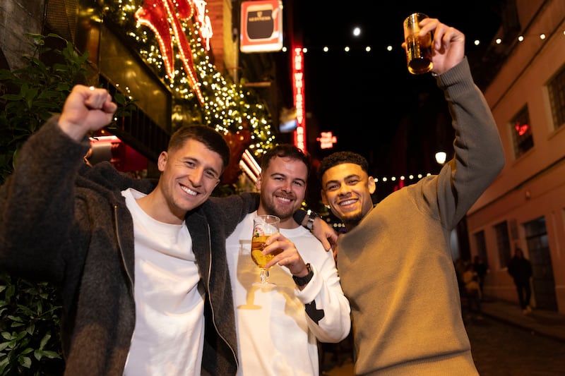Brothers Tom and Lewis Cotter and their friend Isaac Harper, from Leicester in Temple Bar. Photograph: Tom Honan
