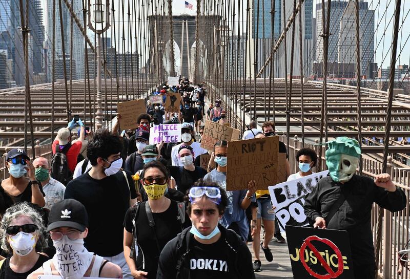Protesters gathered on Brooklyn Bridge in New York to demonstrate against the death of George Floyd. Photograph: Angela Weiss/AFP via Getty