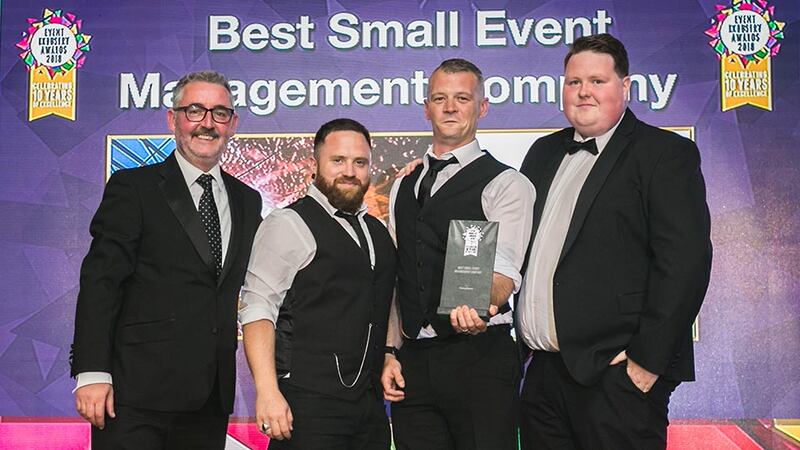 Elaine White, Conference & Events Sales Manager, The Helix, presents the Best Professional Conference Organiser award to the Abbey Conference & Events team.