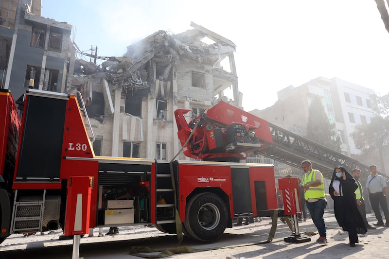 A fire truck is seen outside a building that was hit by Israeli air strikes in central Tehran, Iran. Photograph: EPA
