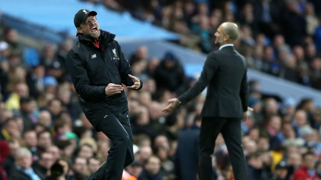 Manchester City’s manager Pep Guardiola and Liverpool’s manager Jurgen Klopp during the English Premier League at the Etihad Stadium. Photograph: EPA