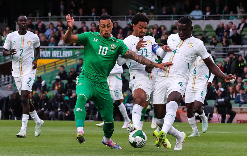 Ireland’s Adam Idah with Abdoulaye Seck and Abdou Diallo of Senegal. Photograph: Bryan Keane/Inpho