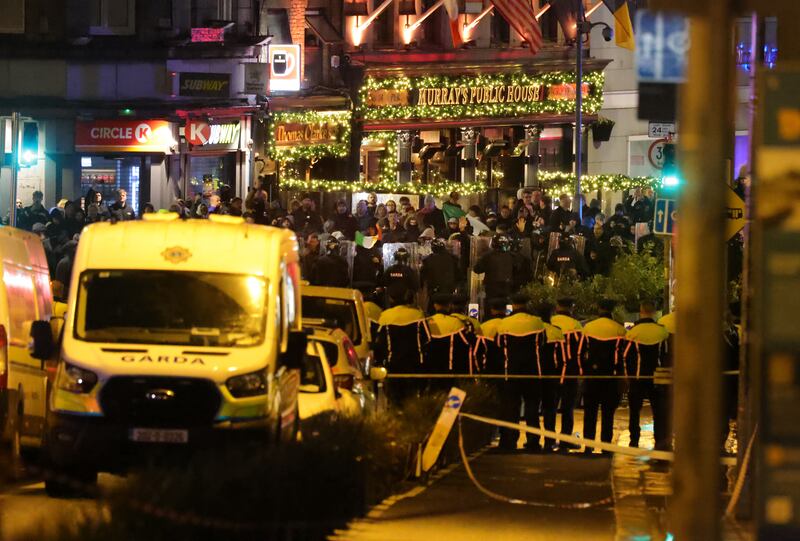 23/11/2023 - NEWS - Gardai Confront Rioters at the top of Dublins O’Connell St after riots broke out in the aftermath of a knife attack on Parnell Square Photograph: Alan Betson / The Irish Times

