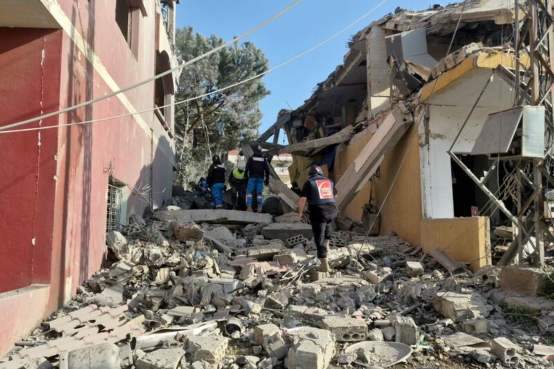 First responders gather at the site of an Israeli air strike that targeted a neighbourhood in the southern Lebanese village of Kfar Roummane, on Monday. Photograph: Abbas Fakih/AFP via Getty