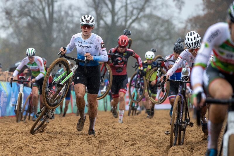 Britain's Zoe Backstedt carries her bike over a sanded area of the track. Photograph: Tom Honan 