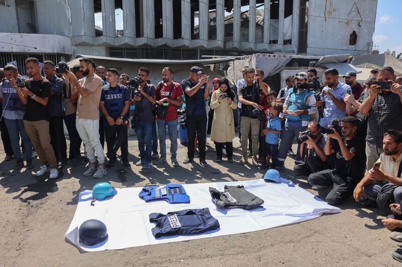 Demonstrators gather in solidarity with journalists killed by Israeli strikes in the Gaza Strip, during a protest organised by the Gaza Journalists Syndicate, in Gaza City, on August 26th. Photograph: Omar al-Qattaa/ AFP via Getty Images       
