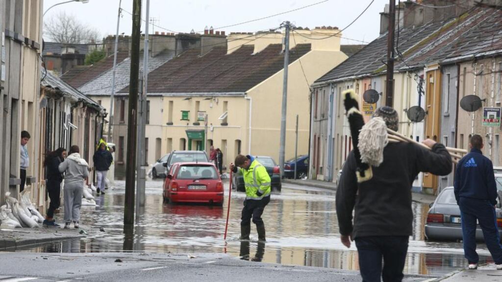 Householders react to flooding earlier this year. Photograph: Patrick Browne