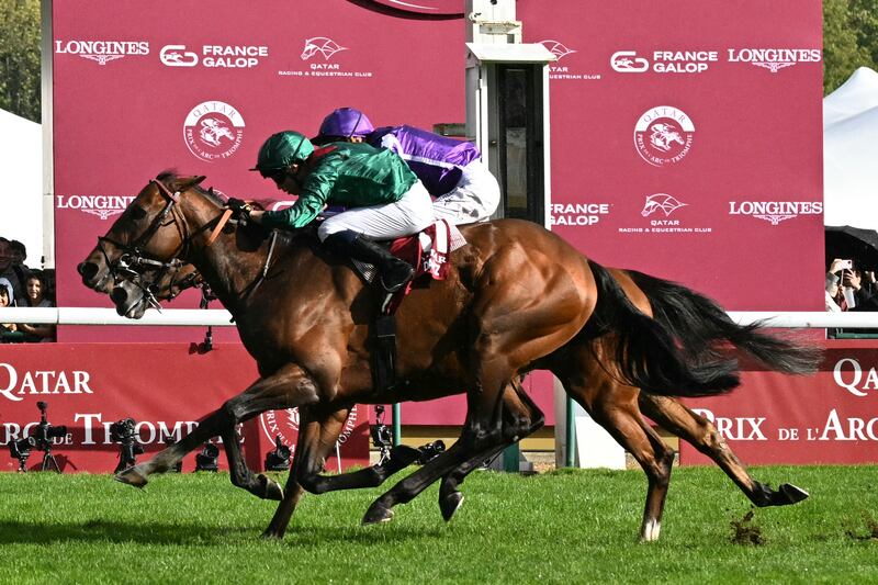 Mickael Barzalona rides Daryz (front) ahead of Christophe Soumillon on Minnie Hauk to win the Prix de l'Arc de Triomphe. Photograph: Anna Kurth/AFP via Getty Images       