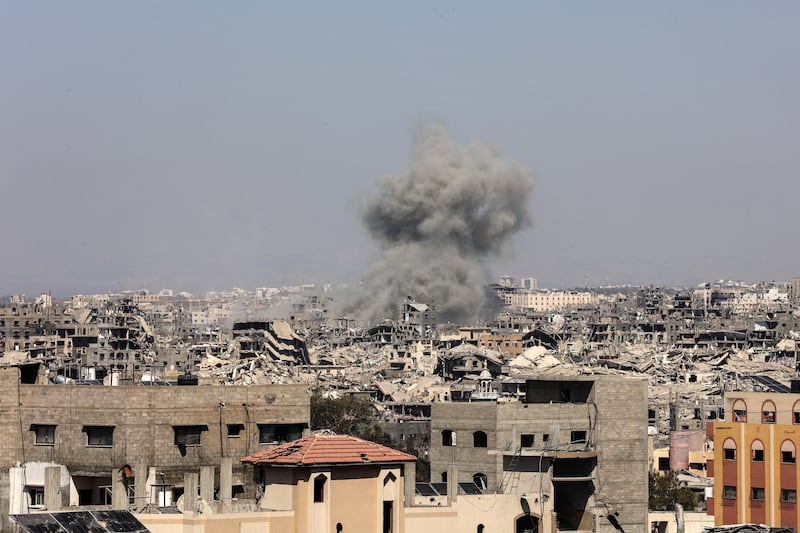 A plume of smoke billows in Jabalia in the northern Gaza Strip after an Israeli air strike on Thursday. Photograph: Omar Al-Qattaa/AFP via Getty Images