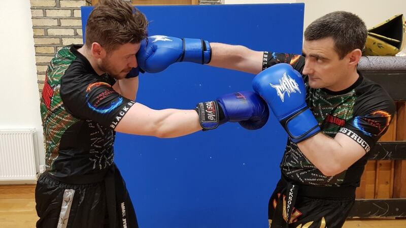 Sensei Kenny Barry sparring with  Sensei Arran Kane