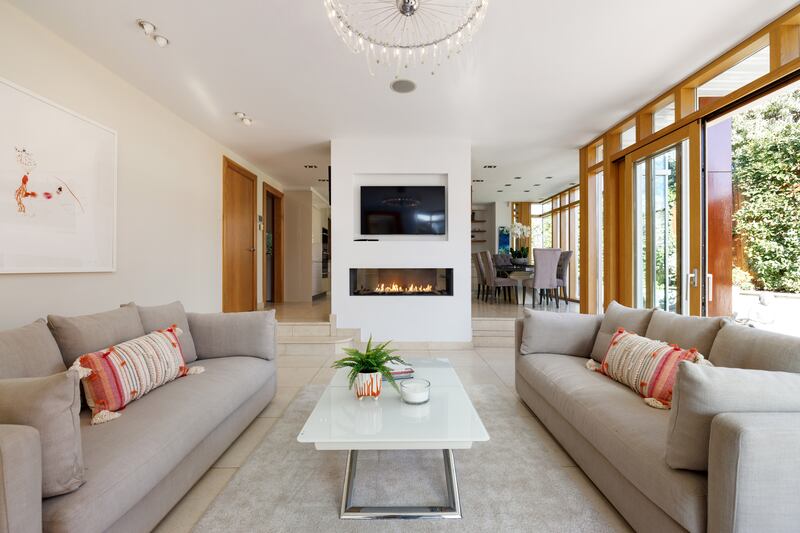 All rooms lie off the central atrium including the three reception rooms that open to the garden. Photograph: Andrew Nolan Photography