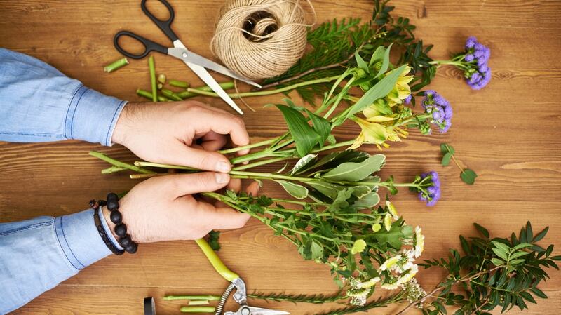 Cut flower stems at a 45-degree angle before putting them in water. Photograph: Getty