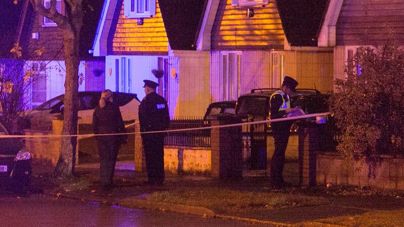Gardaí  at the scene of the shooting on Clonshaugh Avenue, Dublin. Photograph: Gareth Chaney/Collins