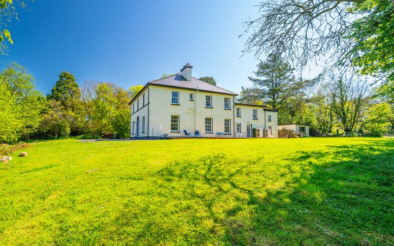 Lawn House sits within 5.4 acres of lawn, meadow and woodland gardens