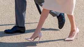 Meghan Markle’s tights are a metaphor for how far she’ll have to go to fit in