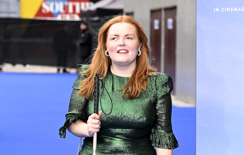 During lockdown, and out of work as a journalist, Lucy Edwards, who is blind, started posting videos on TikTok. Photo: Shane Anthony Sinclair/Getty