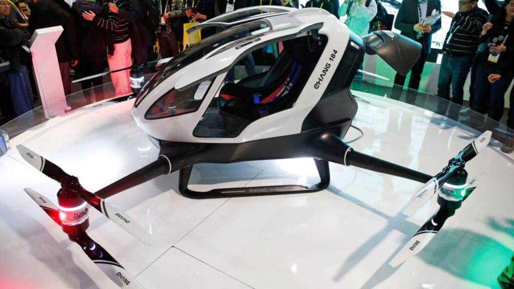 Ehang’s single-seater autonomous minicopter prototype: the passenger straps in, touches in a destination, and the machine does the rest. Photograph: AP Photo/John Locher