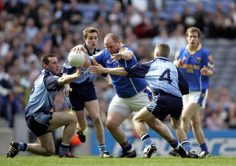 Longford's Niall Sheridan is challenged by Dublin's Stephen O'Shaughnessy, Paul Griffin and Paddy Christie during the 2005 Leinster Championship. Photograph: Tom Honan/Inpho