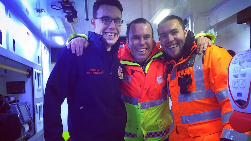 Ros Mac Cobb, centre, his brother Cathal (left) are both working with Dublin Fire Brigade on Christmas Day. Their brother Donnchadh (right) will be on call for the Irish Coast Guard.
