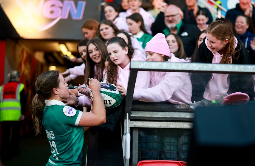 Ireland’s Robyn O'Connor signs autographs for fans after the game against Wales in the 2026 Guinness Women's Six Nations Championship Round 4, Affidea Stadium, Belfast. Photograph: Nick Elliott/Inpho