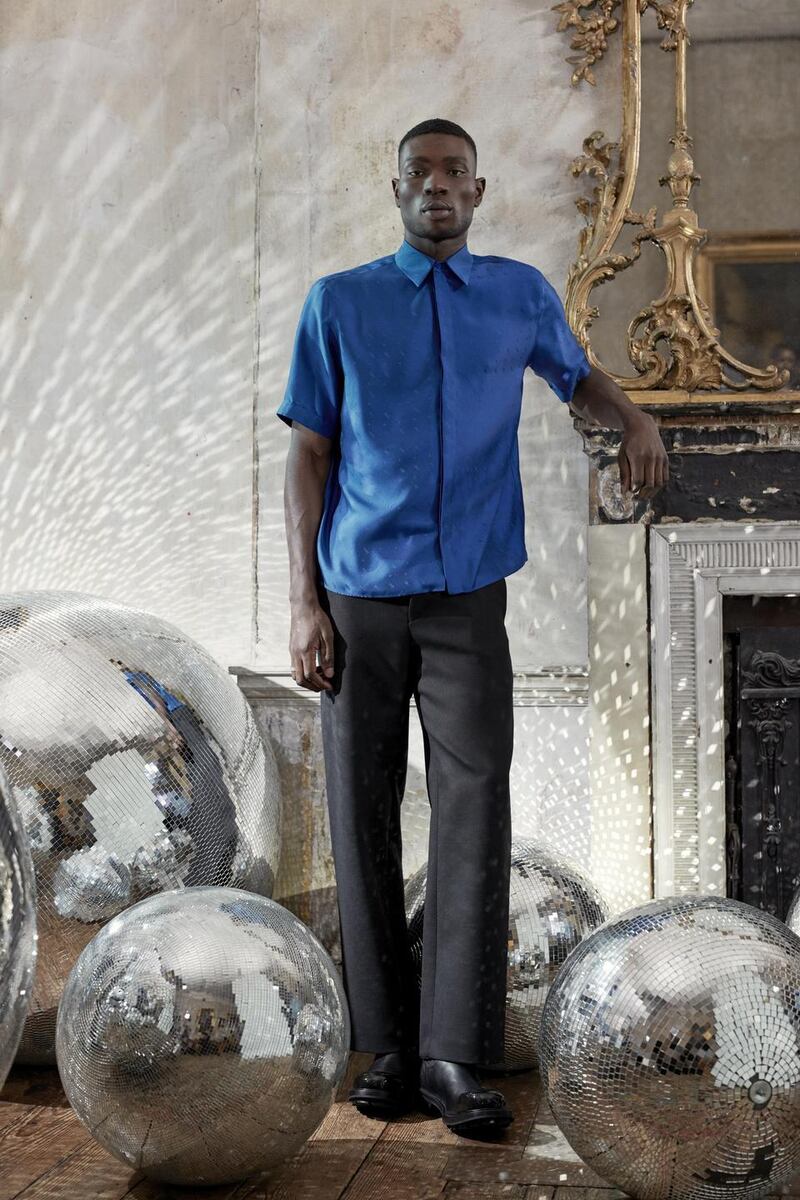 Shirt €795 Fendi; trousers €199 Tiger of Sweden; boots €850 Alexander McQueen