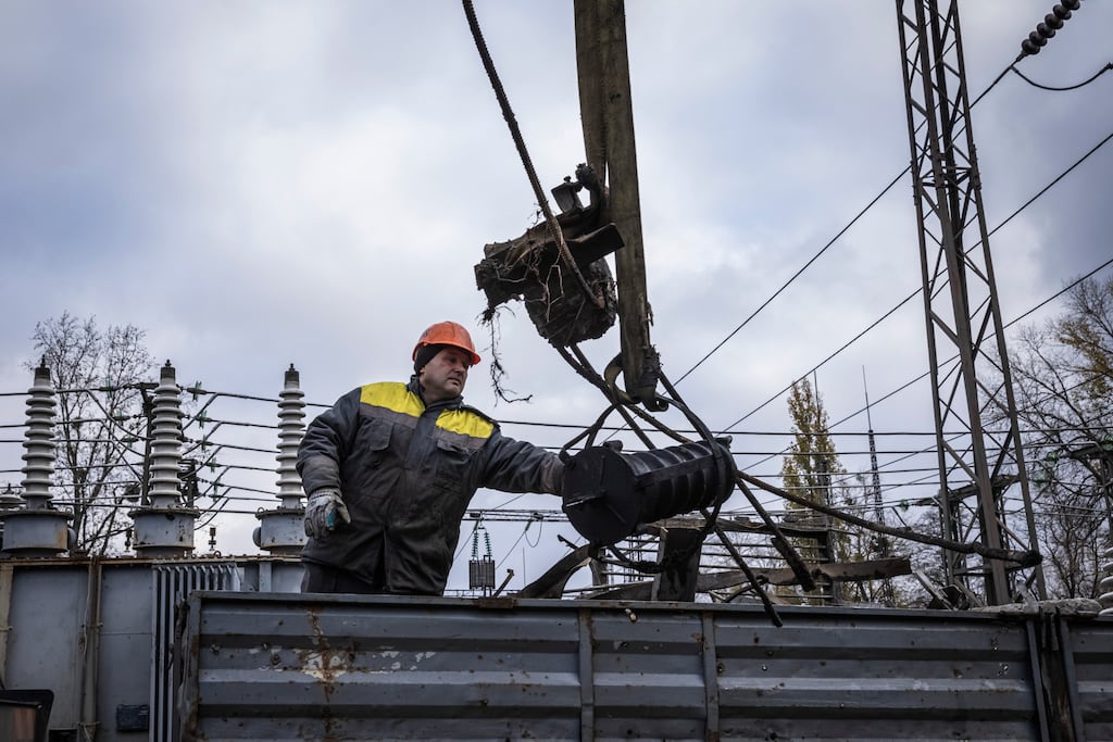 Workers repair infrastructure in a power plant that was damaged by a Russian air attack in October, on November 04th, 2022 in Kyiv Oblast, Ukraine. Photograph: Ed Ram/Getty Images