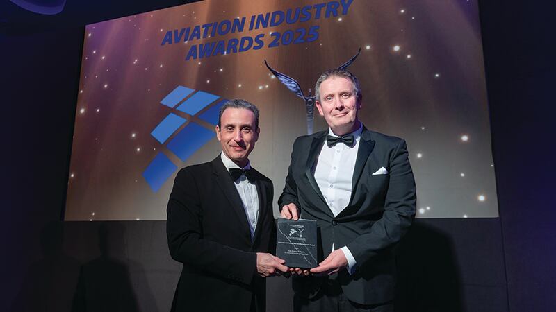 Kyriakos Kourousis, awards judge, presents the innovation in safety and risk management award to Jonathan Heavey, Irish Aviation Authority