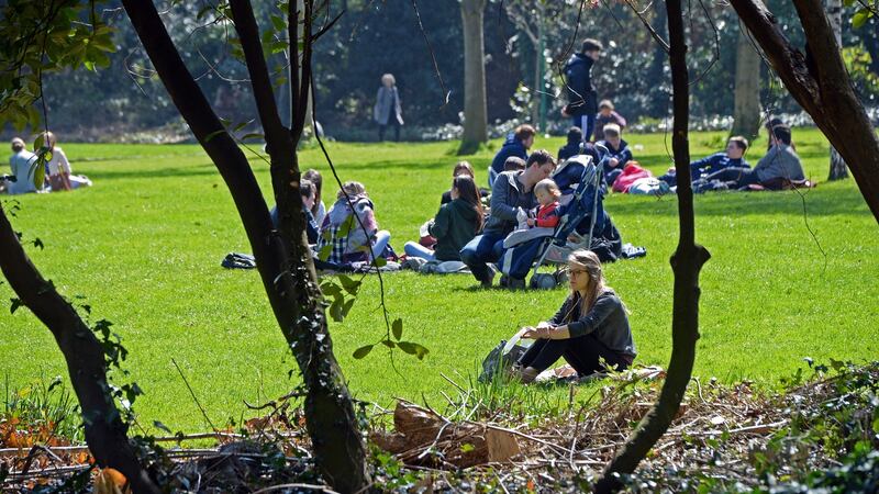 People enjoying their lunch break in the sunshine at Merrion square, Dublin, on Wednesday. Photograph: Eric Luke/The Irish Times