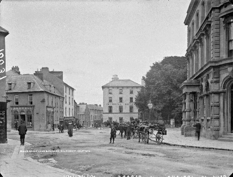 Kilkenny City,  Parade junction, c1900. Jarvey taxis are outside the Bank of Ireland,  a Free State garrison during the Battle of Kilkenny in May 1922. The Imperial Hotel is at the corner of Rose Inn Street, centre background. The hotel was a pivotal position for antiTreaty forces and was subjected to a heavy assault by Free State forces. Photograph:  National Library of Ireland