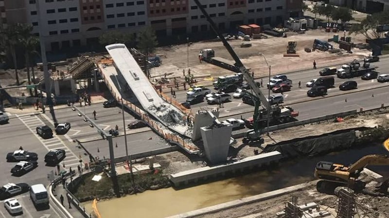 A footbridge has collapsed onto a highway in Florida, with casualties so far unclear. Photograph: Twitter