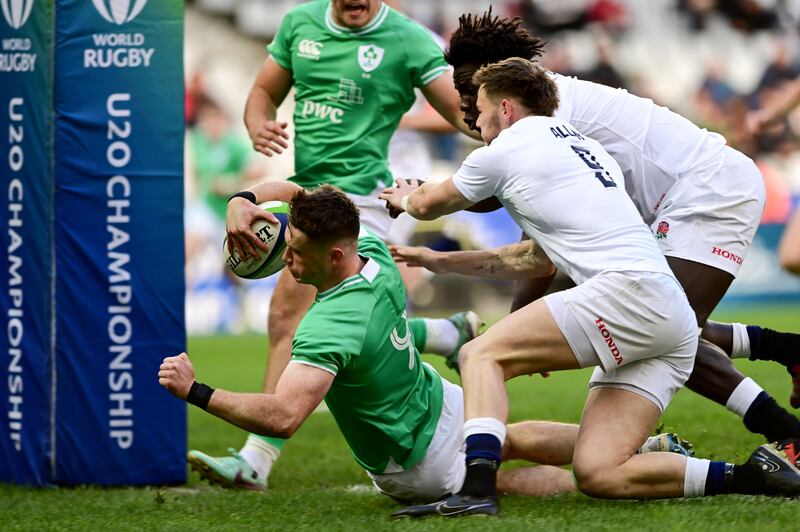 Ireland's Oliver Coffey scores an early try against England in the World Under-20 Championship semi-final at DHL Stadium, Cape Town. Photograph: Darren Stewart/Inpho 
