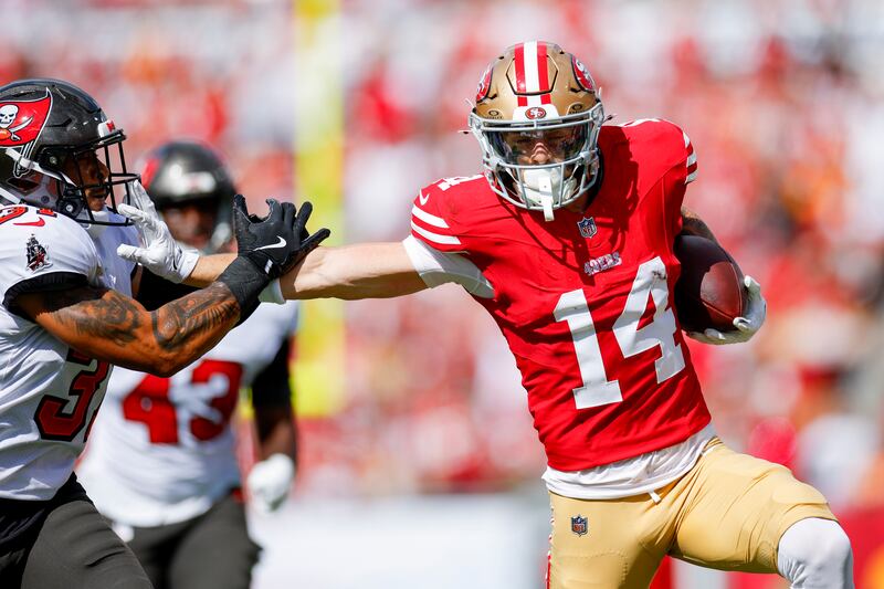 Ricky Pearsall of the San Francisco 49ers runs with the ball for a touchdown during the first quarter against the Tampa Bay Buccaneers. Photograph: Mike Ehrmann/Getty Images