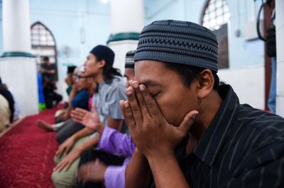 Nóra Quoirin: prayers for the missing schoolgirl at a mosque in Seremban. Photograph: Mohd Rasfan/AFP/Getty