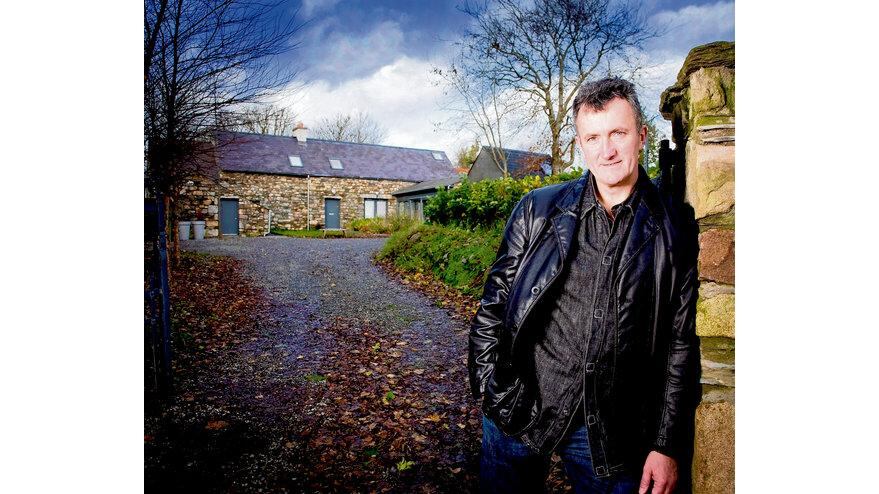 CREATIVE COCOON (clockwise from above left): Pat McCarthy at the entrance to Ballilogue Clochán; the sittingroom; dining room; garden. PHOTOGRAPHS: MARK McCALL