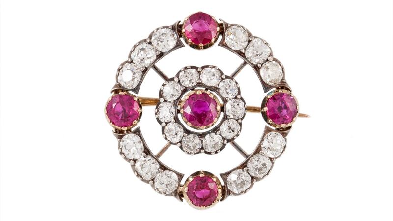 Early 20th century ruby and diamond circle brooch, boxed, with rubies (3.20ct) and diamonds (4.30ct ), €7,500–€9,000 O’Reilly’s