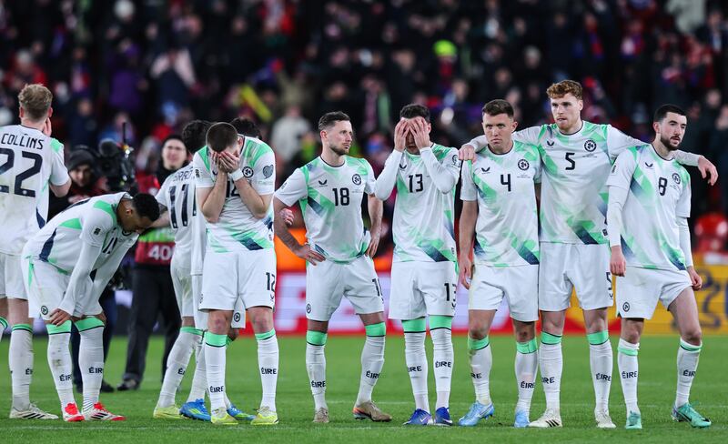 The Ireland team dejected after losing in the penalty shootout. Photograph: Ryan Byrne/Inpho