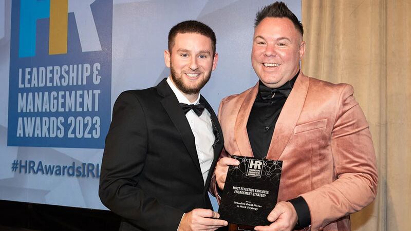 Adam Kane, entries lead, BusinessRiver, presents the most effective employee engagement strategy award to David Nally, Woodie’s