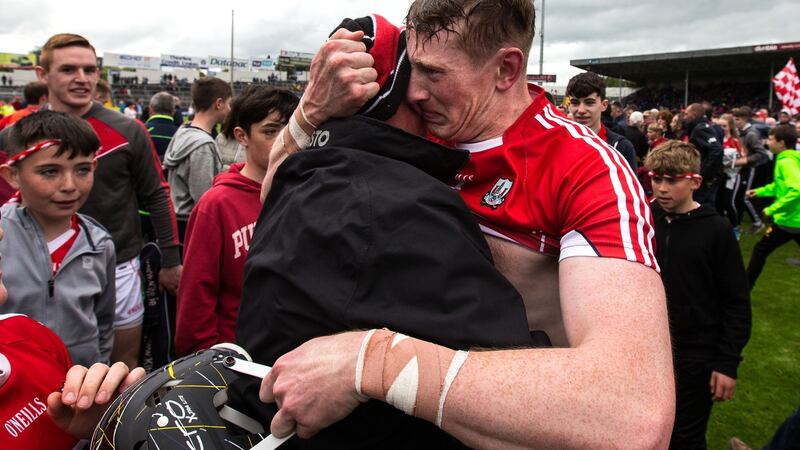 Cork’s Damien Cahalane celebrates with supporters after the game. Photograph: Cathal Noonan/INPHO