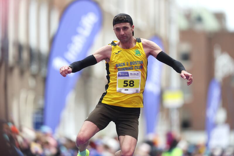 John Kinsella crossing the line at the end of last week's Dublin Marathon. Photograph: Bryan Keane/Inpho