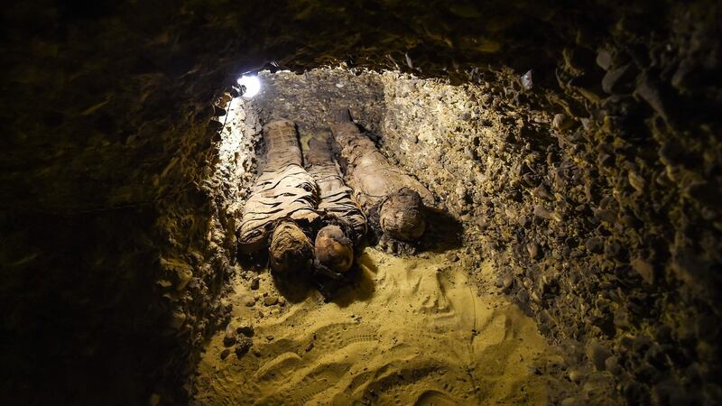 Newly-discovered mummies wrapped in linen found in burial chambers dating to the Ptolemaic era (323-30 BC) at the necropolis of Tuna el-Gebel in Egypt’s southern Minya province.   Photograph: AFP