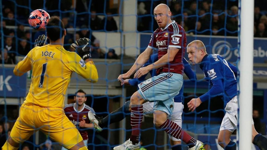 West Ham United’s James Collins heads home past Everton goalkeeper Joel Robles during the FA Cup third-round match at Goodison Park. Photograph: Phil Noble/Reuters