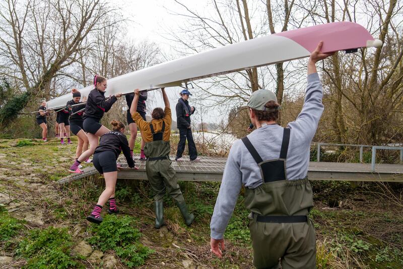 A Trinity team and their boat. Photograph: Barry Cronin