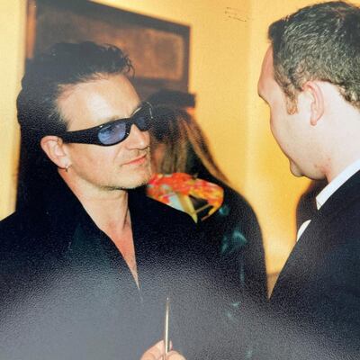 Memento: Jason O’Callaghan’s photograph of himself with Bono, on the singer’s 40th birthday, in 2000