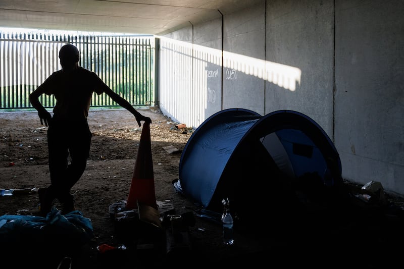 Philip with his belongings and tent in a tunnel beneath the N2/M50 interchange. Photographs: Dan Dennison.