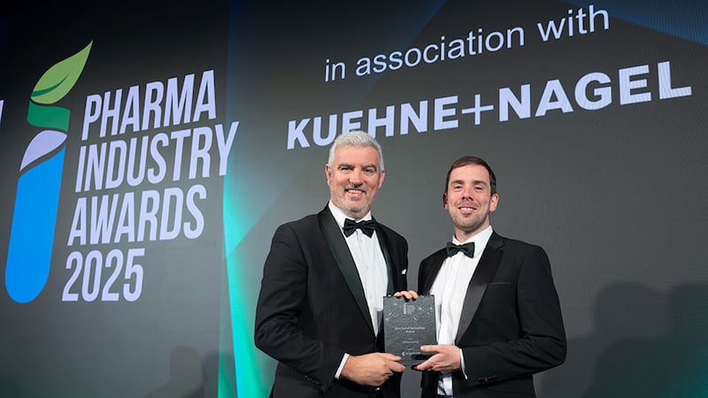 Declan Lynch, head of life science manufacturing EMEA at Cognizant, presents the best use of technology award to Alan Hibbitts, LEP Biomedical