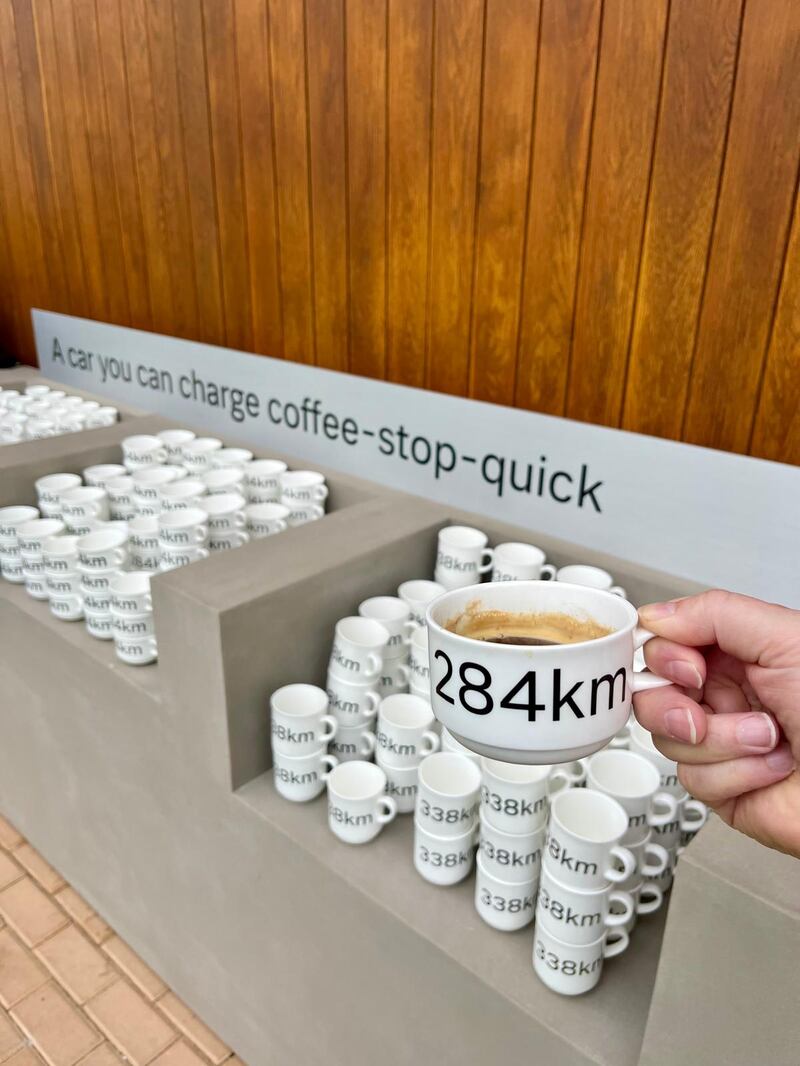 Volvo says the new EX60 can get 284km of charge while you finish a coffee this size.