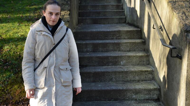 Louise Hyland: has lived in three separate rentals over the past 10 years. All were cold, damp, or both, and each time she moved, the rent – subsidised by social welfare – became more expensive.   Photograph: Dara Mac Donaill
