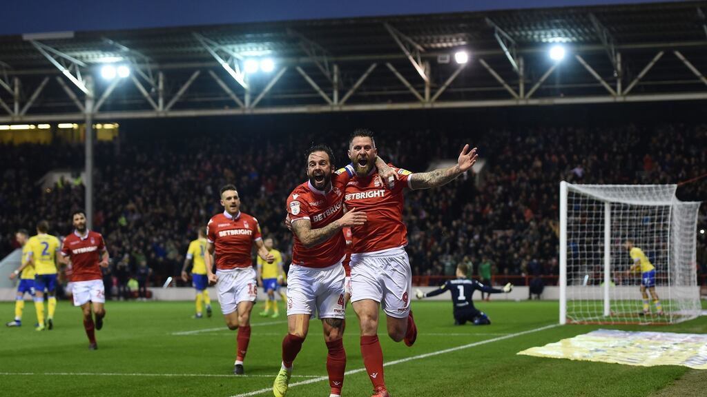 Daryl Murphy celebrates scoring Nottingham Forest’s crucial third against Leeds. Photograph: Joe Giddens/PA