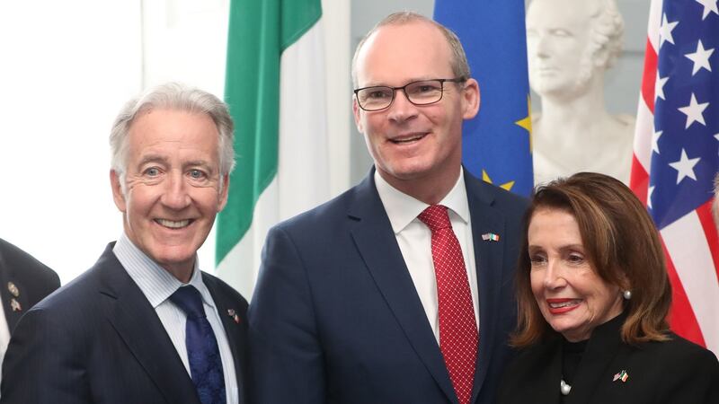 US House of Representatives speaker Nancy Pelosi (right) and Congressman Richard Neal (left) are greeted by the Tánaiste Simon Coveney,  at Iveagh House, Dublin: Niall Carson/PA